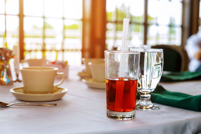 Close-up of beer in glass on table