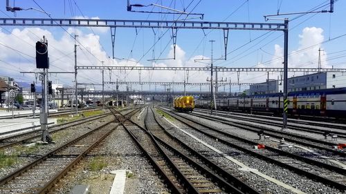 Railroad station platform against sky