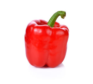 Close-up of red bell pepper against white background