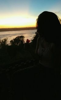 Scenic view of sea against sky at sunset