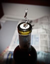 Close-up of glass bottle on table