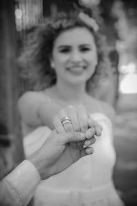 Portrait of happy woman with hands