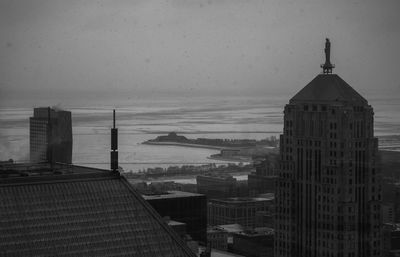 View of cityscape by sea