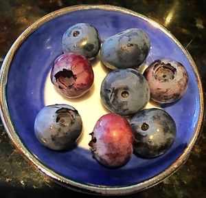 High angle view of fruits in plate on table