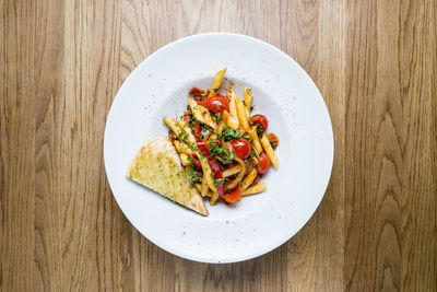High angle view of salad in plate on table