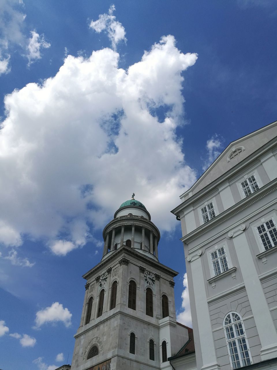 building exterior, sky, architecture, built structure, cloud - sky, low angle view, building, nature, no people, day, city, travel destinations, history, the past, blue, belief, window, outdoors, religion, dome