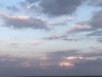 Low angle view of clouds in sky during sunset