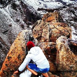 Man standing on rock formation