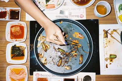 Directly above shot of woman having food on table