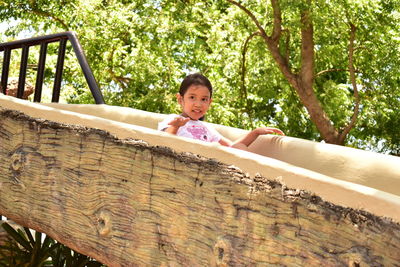 Portrait of boy playing in park