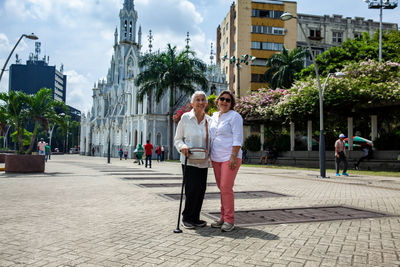 Senior mother and daugther travelling togeher. senior adults in cali colombia. senior lifestyle. 