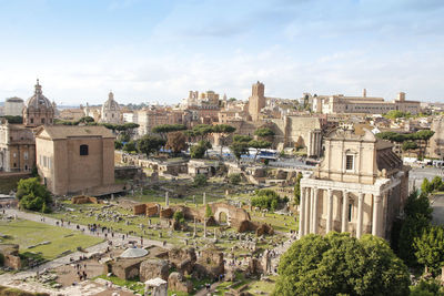 Aerial panoramic cityscape view of the roman forum during sunset in rome, italy