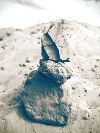 Close-up of stone stack on rock