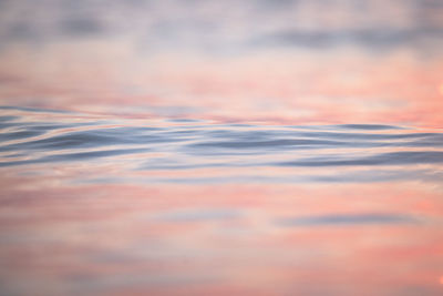 Full frame shot of sea against sky during sunset