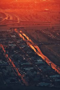 Aerial view of city at sunset