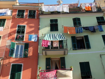 Low angle view of clothes drying on building