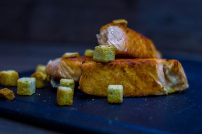 Close-up of meat on cutting board