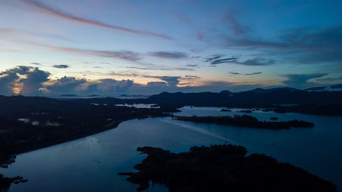 Aerial view of kenyir lake during blue hour sunrise.