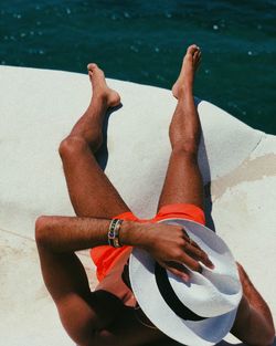 High angle view of man relaxing on boat