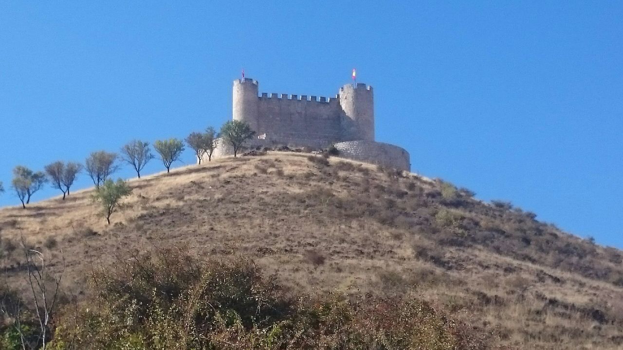 LOW ANGLE VIEW OF CASTLE AGAINST BLUE SKY
