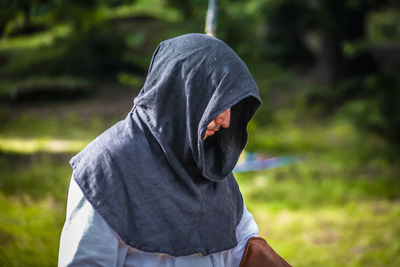 Midsection of man standing outdoors