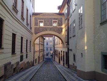 Narrow alley along buildings