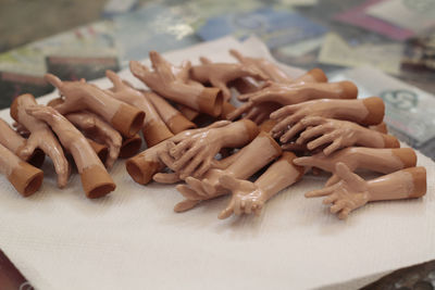 Fake hands used for the creation of neapolitan dolls