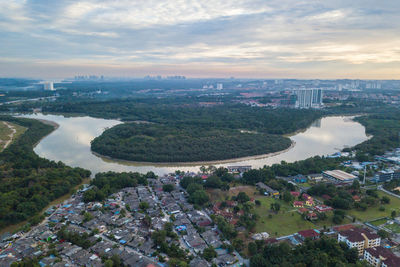 High angle view of river amidst buildings in city