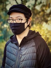 Portrait of young man wearing eyeglasses