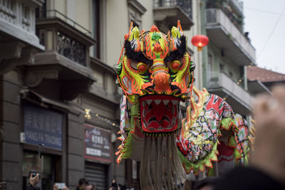 Low angle view of multi colored chinese dragon on display