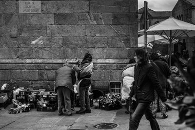 Man looking at city street