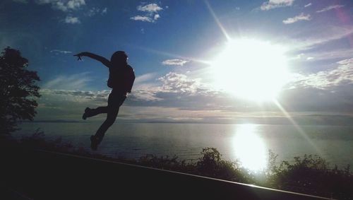 Sun shining over sea