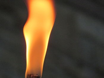 Close-up of lit candle