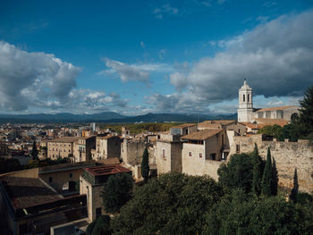 Panoramic view of townscape against sky in city