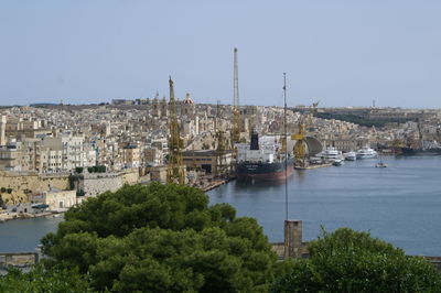 Panoramic view of cityscape against clear sky