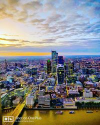 High angle view of buildings against sky during sunset