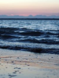 Scenic view of sea at sunset