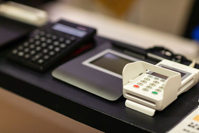 Credit card reader on table in store