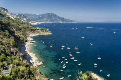 High angle view of bay and sea against sky