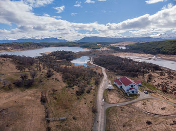 High angle view of road by landscape against sky