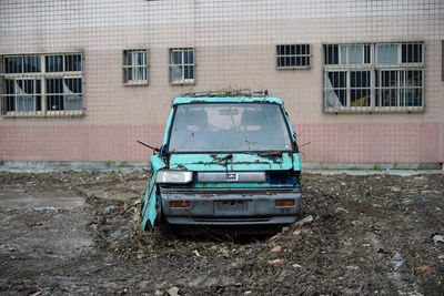 Abandoned car on street
