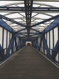 Footbridge against sky