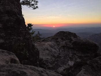 Scenic view of mountains at sunset