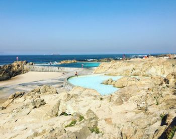 Piscinas de mares by sea against clear sky