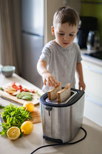 Boy preparing food at home