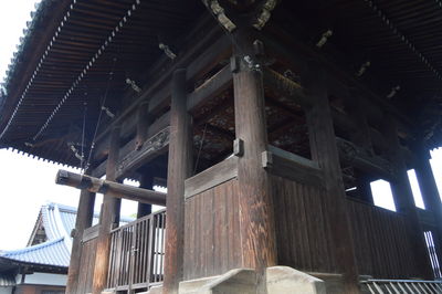 Low angle view of bridge against sky during winter