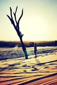 Scenic view of sea against sky at sunset