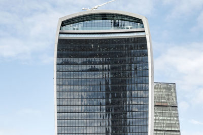 Low angle view of modern building against sky