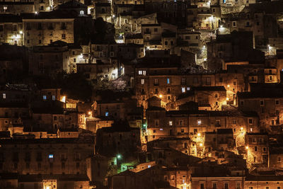 High angle view of buildings at night