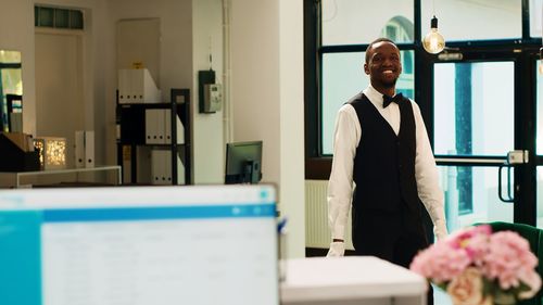 Portrait of businessman standing in office